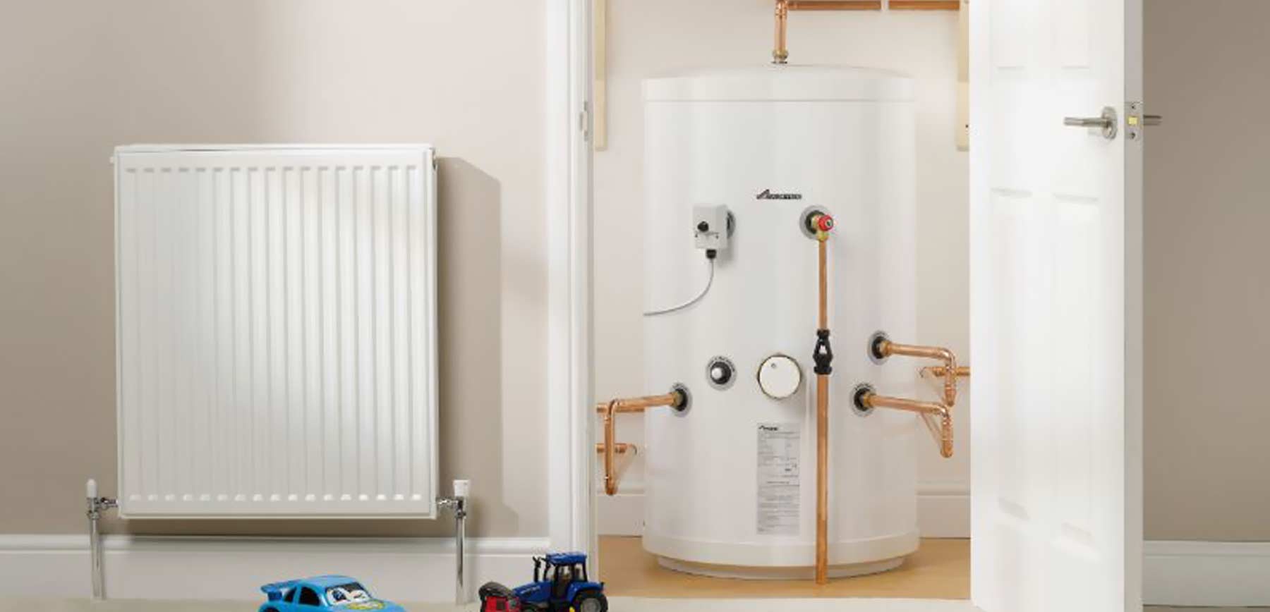 Hot water cylinder in cupboard